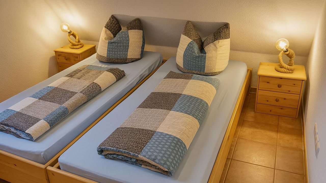 Schlafzimmer im Obergeschoss Schlafzimmer im Obergeschoss